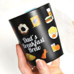 Black Mug with personalised dad’s breakfast crew design made with Forever Transfers Multi-Trans Paper