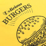 Black Burger design on yellow fabric made with Forever A3 Subli-Light Paper