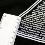 Ruler on shirt printed with Forever Flex Soft No Cut Paper in Matt White