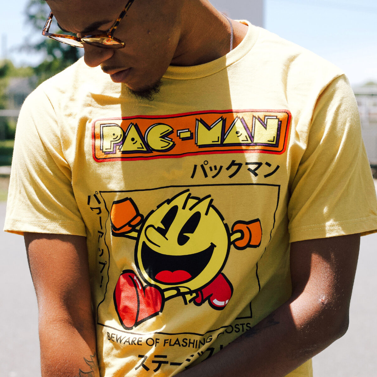 Man in yellow Pacman design shirt printed using Forever Laser Light No Cut Paper