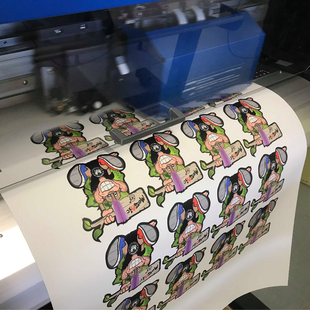 Sheet of monkey prints on Roland SG2 Series print and cut machine with Sef MoZaic 500mm wide Vinyl