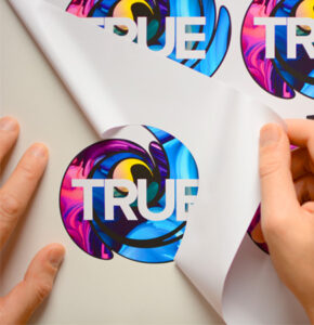 True Print Die Cut labels being peeled, printed using Roland True Vis VG2 Printers
