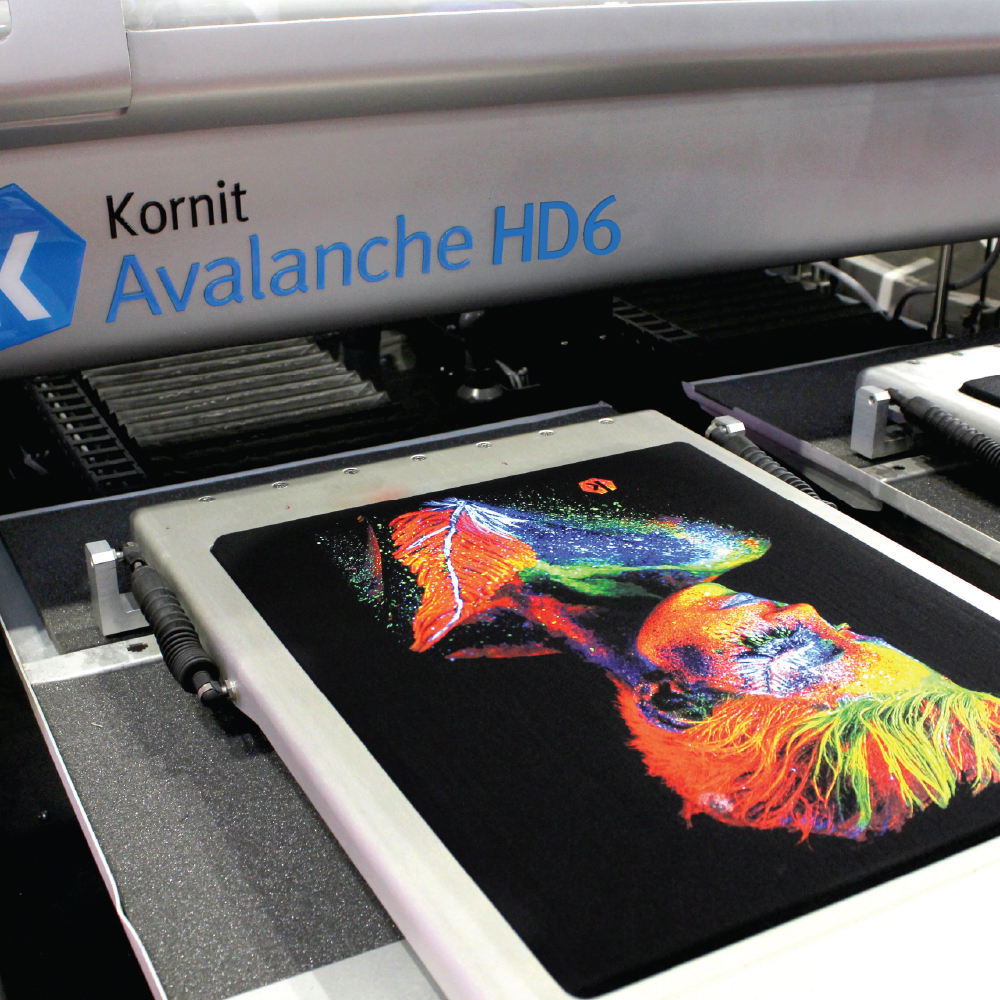 Kornit Avalanche HD6 printer with black garment design featuring colourful woman