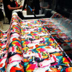 Large bird design being printed onto fabric using Kornit Presto