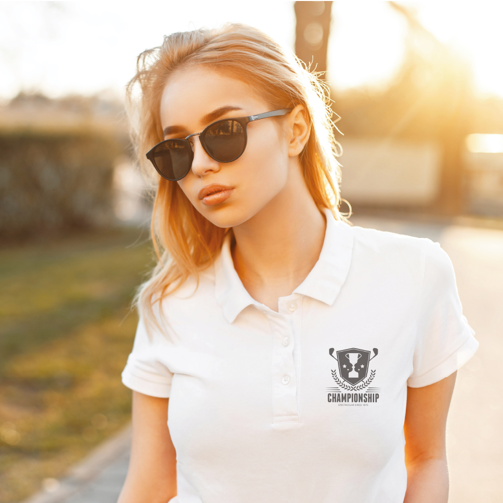 Woman in sunglasses outside with championship logo on T-shirt printed with Five Star Universal Paper