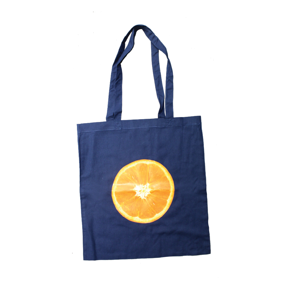 Navy Blue Tote Bag with print of Orange Slice printed using Forever Laser Dark Cuttable Paper on white background