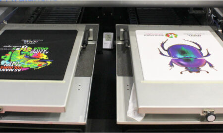 Two printing pallets on a kornit digital direct to garment printer