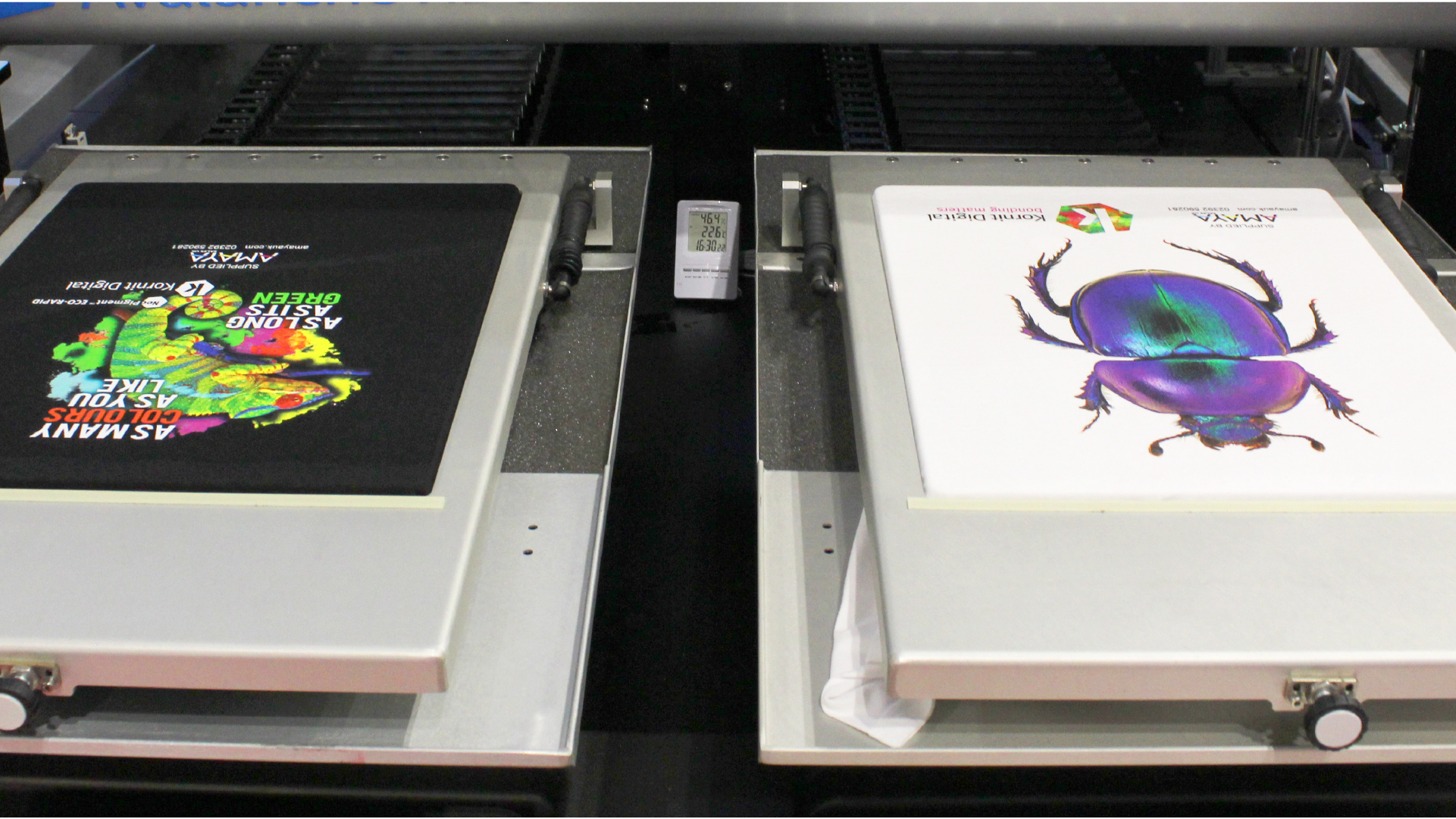 Two printing pallets on a kornit digital direct to garment printer