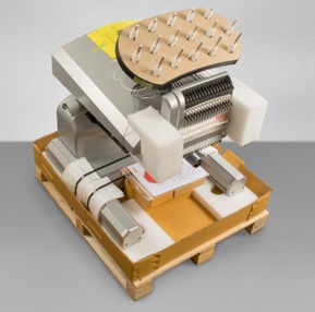 Melco Embroidery Machine in packaging