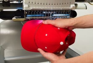 Melco Loading a hooped cap